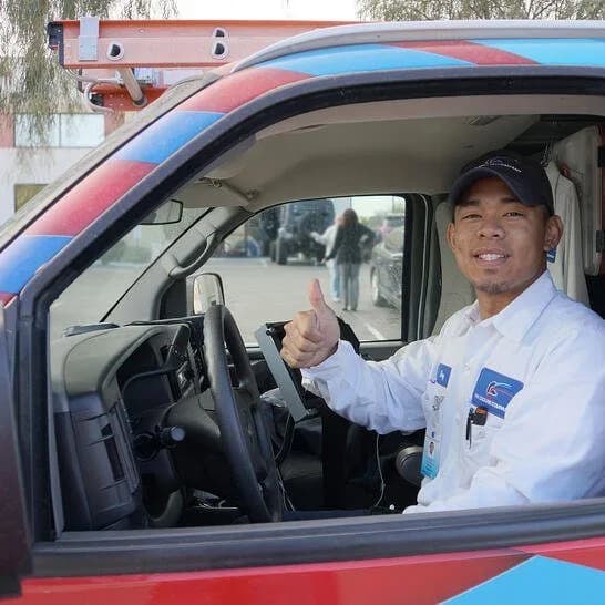 Ray, HVAC Technician at The Cooling Company, ready for service in a TCC van in Las Vegas