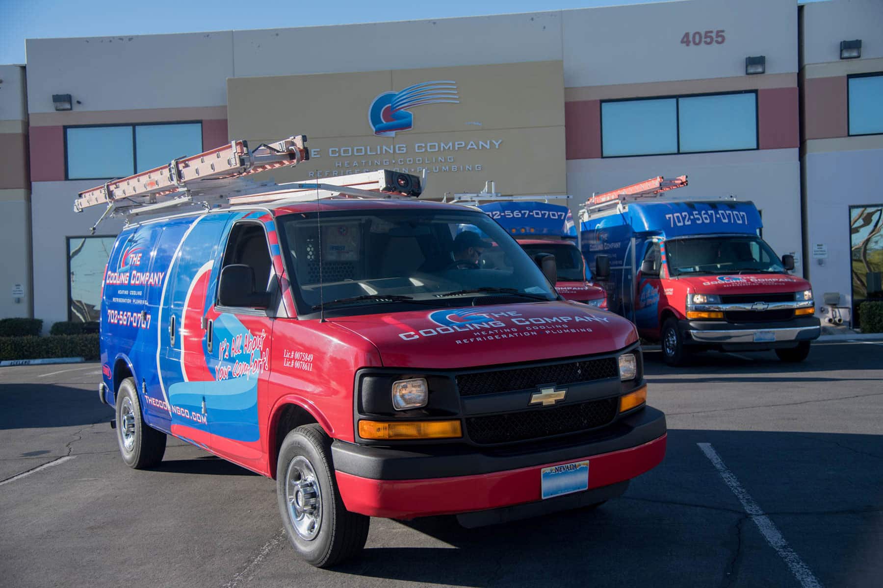 Two Cooling Company branded service vans