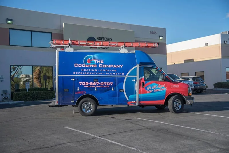The Cooling Company service van at a job site