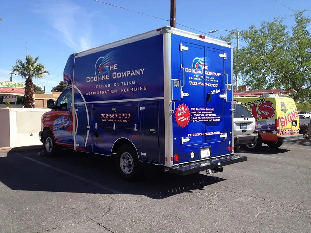 Technician installing an air filtration system in a Las Vegas home